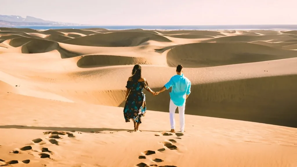 Couple Enjoy nature in Sahara desert