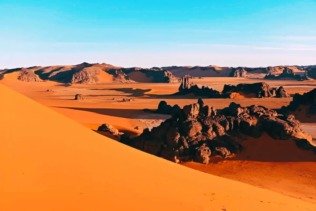 Things to Do in the Sahara Desert,Sahara desert with rocks, sand and mountains